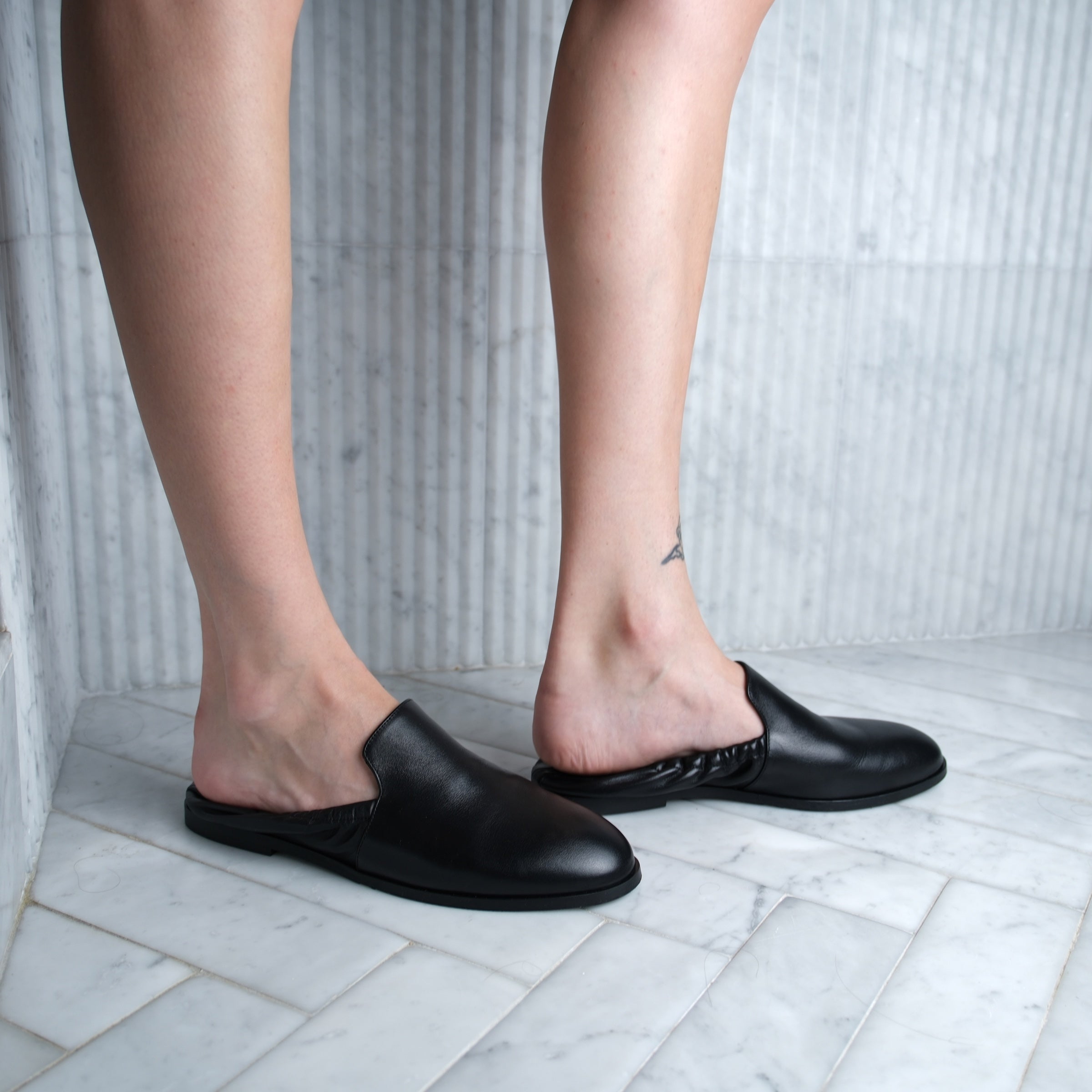 Nami Leather Mules worn on foot